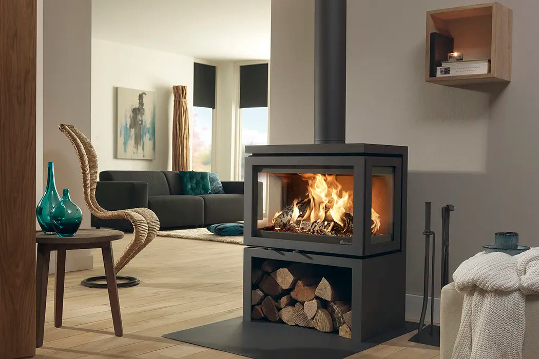 Dik Guerts Vidar triple glass wood burning stove in a modern room. Stove is lit