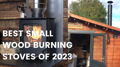 small-lit-wood-stove-with-kettle-on-top-in-a-shed
