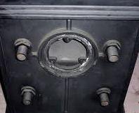 a close photo of the four ports of a wood burning boiler stove