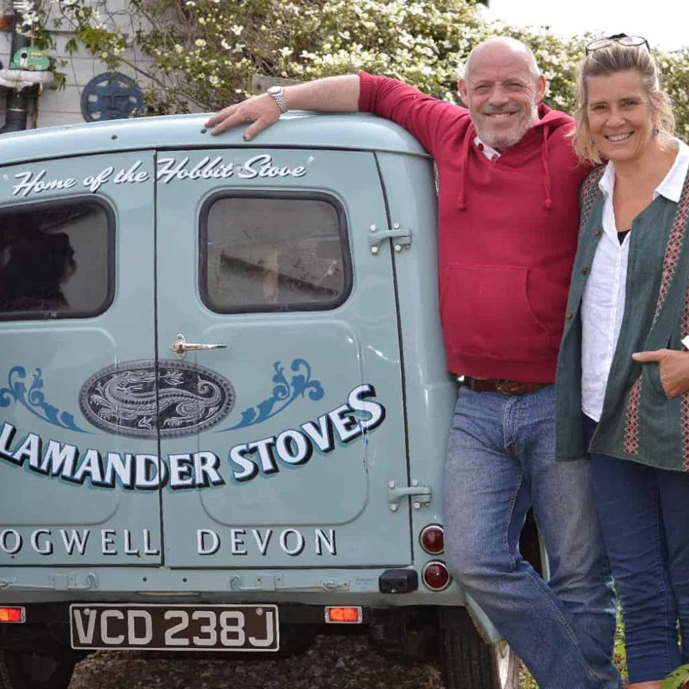 Owners of Salamander Stoves standing next to their van