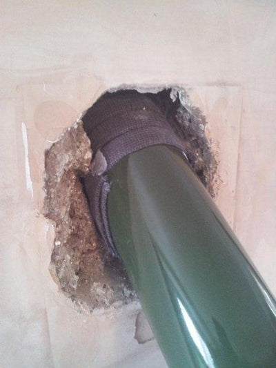 vitreous pipe through wall protecting pipe and wall with webbing