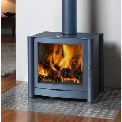 A Firebelly wood stove on a recessed metal hearth