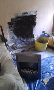 gorilla buckets used in clearing rubble from fireplace