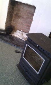 A rather small brick fireplace opening. Will the stove fit in?
