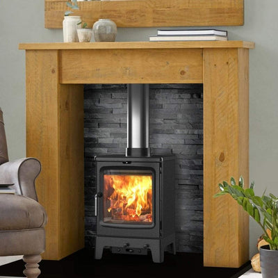 Saltfire Stoves Saltfire Peanut 5 Wood Burning Stove with a wood surround